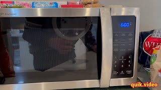 How to Set the Clock on A Sharp Microwave Oven [upl. by Nnylakcaj]