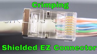 Shielded ezrj45 cat6 connectors being crimped [upl. by Mariquilla545]