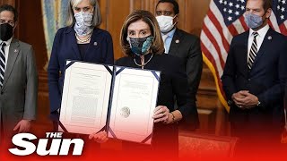 Pelosi signs articles of impeachment against President Trump [upl. by Barger]