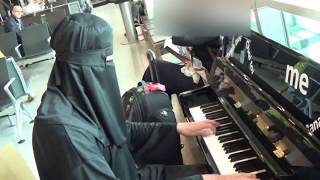 Burka Pianist Amazes Passengers at The Airport [upl. by Nodnorb122]