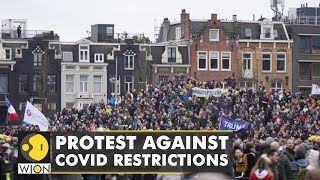 Thousands of people took to the streets of Amsterdam to protest against COVID restrictions  WION [upl. by Ahsiret789]