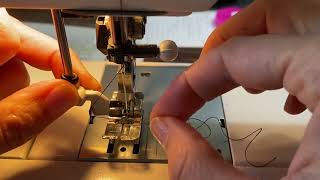 Using a needle threader on a sewing machine [upl. by Eslud288]