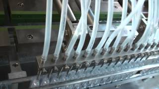 Plastic ampoules filling and sealing machine [upl. by Shoshana]