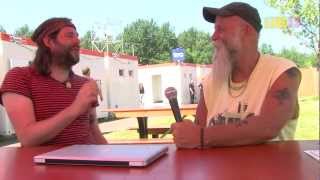 Seasick Steve performing a self build diddleybow during LiveXS interview at Pinkpop [upl. by Ylahtan224]