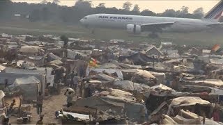 Displaced persons arrive at Bangui airport in CAR [upl. by Eniar]