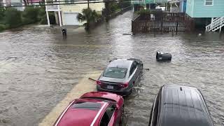 Trash Can Floats Down Flooded Street in Carolina Beach [upl. by Nolasba45]