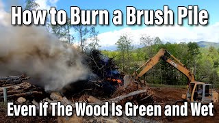 How To Burn A Brush Pile  Even If The Wood Is Green and Wet [upl. by Severen]