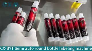 Manual labeling machineCXBYT Semi auto round chubby gorilla bottle sticker labeling machine [upl. by Ttenneb612]