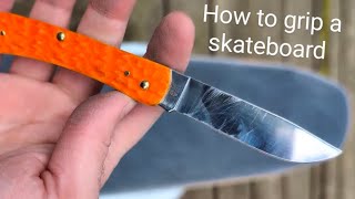 How to put grip tape on a skateboard using my Case Sod Buster Jr [upl. by Jacquette811]