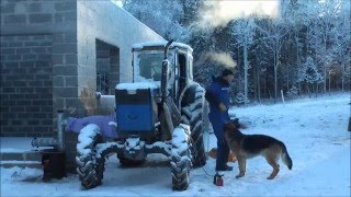 Starting an air cooled tractor in winter Featuring T40AM Russian tractor [upl. by September]