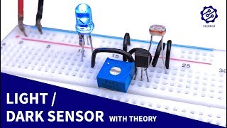 Light Sensor circuit on Breadboard  Darkness Detector  LDR amp Transistor Projects [upl. by Ardnuasak]