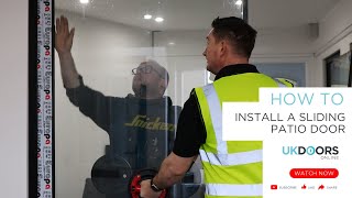 How to Install an Aluminium Sliding Patio Door  UK Doors Online [upl. by Nosmirc996]