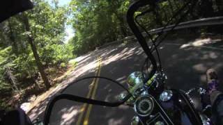 Harley Davidson Softail Deluxe with apehangers leaning it way over in the twisties [upl. by Atilef]