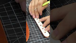 How to punch holes in leather leather bag leatherbackpack shorts leathercraft diy punching [upl. by Ydoj97]