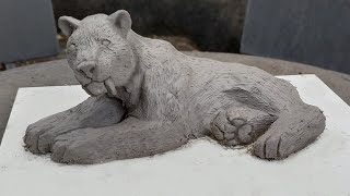 Sculpting Saber Tooth Cat in Clay Smilodon [upl. by Onimixam]