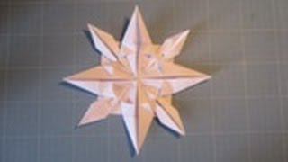 Comment réaliser une étoile de noël en papier origami [upl. by Aennyl]