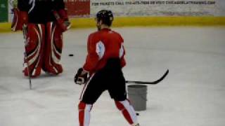 Patrick Kane Kris Versteeg and Corey Crawford pick up pucks after hockey practice [upl. by Ihsar299]