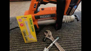 Lock N Lube Greasing Coupler On A Ridgid 18V Grease [upl. by Romeo]