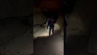 Group Of Cavers Navigating Muddy Cave [upl. by Kho]