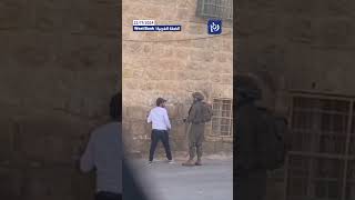 Israeli soldier assaults disabled man in Hebron shorts trending explore [upl. by Nalrah]