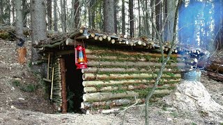 Construction of a warm shelter with a fireplace inside Stayed overnight in a survival shelter [upl. by Ienttirb752]