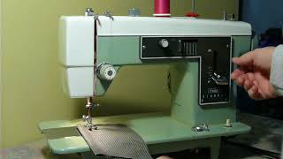 NIFTYTHRIFTYGIRL Kenmore model 1207 basic zigzag sewing machine with blind stitch [upl. by Ayalat812]