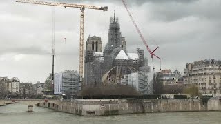 Reconstructed Notre Dame cathedrals spire revealed in Paris after devastating 2019 fire [upl. by Lilaj]