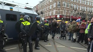 Amsterdam protest against Covid restrictions goes ahead despite ban  AFP [upl. by Llehcor]