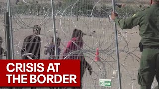 Record border crossings seen at USMexico border [upl. by Ettereve28]