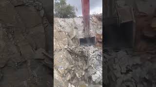 Excavator crushing shale rock process [upl. by Anjela]