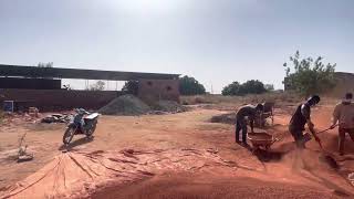 Crushing laterite soil for compressed stabilized earth bricks [upl. by Ntsuj]