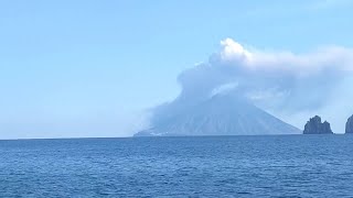 Stromboli volcano looks lively from afar as lava spills into sea [upl. by Ayetal]