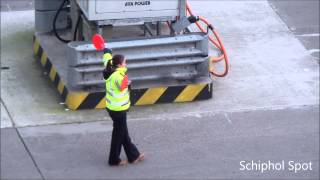 Marshaller at work Amsterdam Airport Schiphol [upl. by Oiralih]