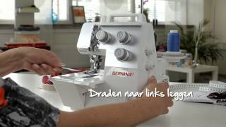 BERNINA overlocker L 220 inrijgen en coversteken naaien [upl. by Llednek]