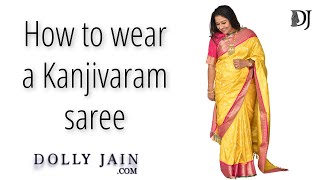 How to wear a Kanjivaram Saree  Dolly Jain saree draping styles [upl. by Mcnamara]