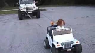 Extreme Power Wheels Jeep pulling real Jeep 4x4 [upl. by Chatwin284]