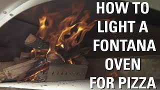 How to Light a Fontana WoodFired Oven for Cooking Pizza  Fontana Forni USA [upl. by Nitsirhc568]