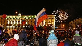 Celebrations in Crimea and Moscow as annexation treaty signed [upl. by Chuipek]