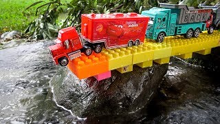 Construction Vehicles Falling in Water  Mack Truck Excavator Dump Trucks Toy for Children [upl. by Blanka]