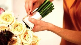 How to Tie Ribbon onto a Floral Bouquet  Wedding Flowers [upl. by Aitnahc176]