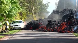 Dramatic timelapse footage shows lava engulfing car in Hawaii [upl. by Enelhtac277]