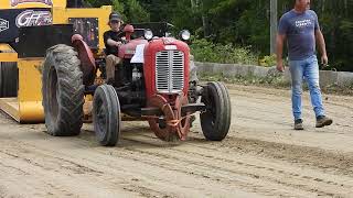 Boy pulls at antique Tractor Pull Richmond Corner NB [upl. by Nomelif782]