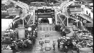 The upper deck of a US LST Landing Ship Tank is loaded with army vehicles at FHD Stock Footage [upl. by Zaremski283]