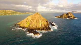 Drone over Mokulua quotTwinquot Islands [upl. by Tanney]