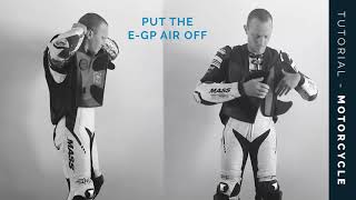 How To Put Your Helite eGP Air Track Vest On and Off [upl. by Gibert936]