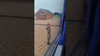 British soldiers salute Ukrainian troops as they depart for the frontlines after completing their tr [upl. by Portie]