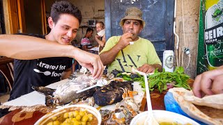 Eating PIG FISH  HUMMUS with Fishermen in Ancient Tyre  Amazing Mediterranean Food [upl. by Regdirb]