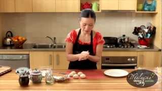 Poh Ling Yeow cooking Malaysian Nyonya Chicken Curry and Roti Canai [upl. by Ploch]