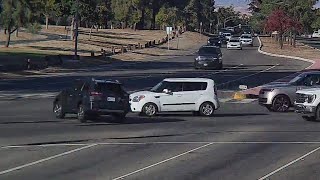 Near Miss Vehicle Runs Red Light amp Dodges Oncoming Traffic [upl. by Brendin]