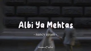 Albi Ya Mehtas  Nancy Ajram  Lyrics Arabic  Latin  Terjemahan  قلبي يا محتاس  نانسي عجرم [upl. by Giacomo]